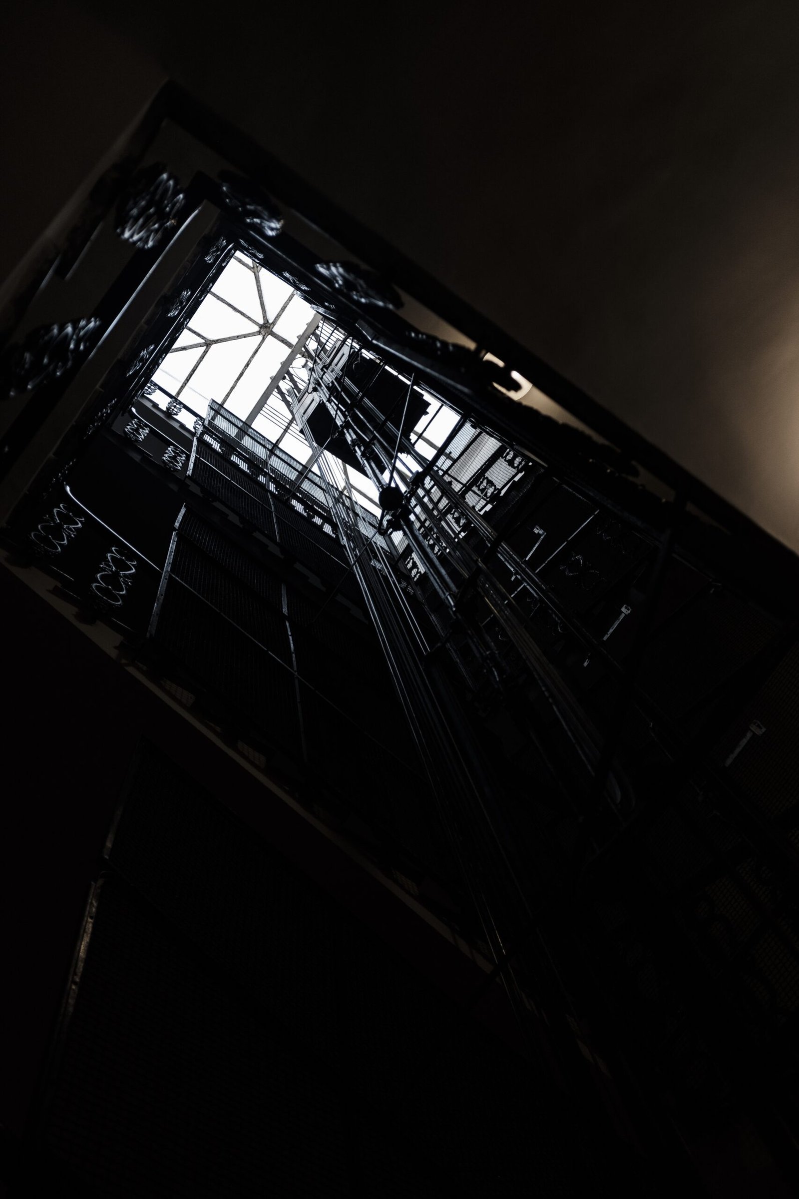 A shaft of an elevator from the inside shot from below
